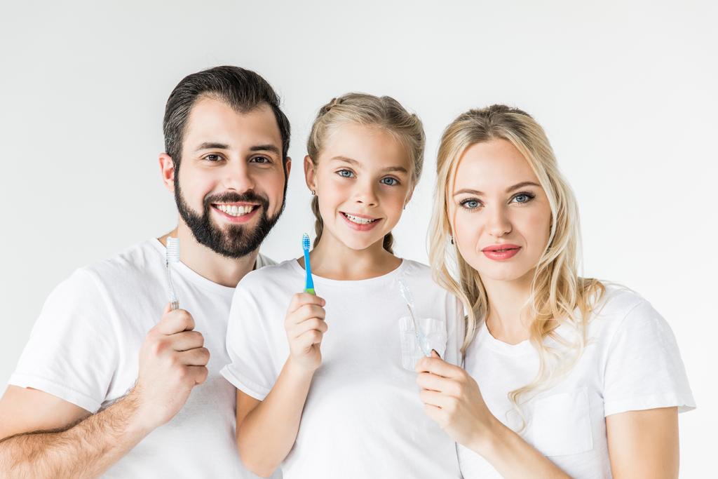 szczęśliwą rodziną, szczoteczki do zębów - Zdjęcie, obraz