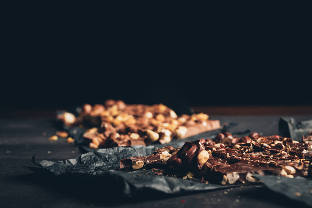Dark and milk chocolate with nuts - Photo, Image