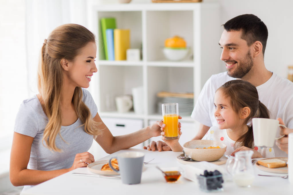 happy family having breakfast at home - Photo, Image