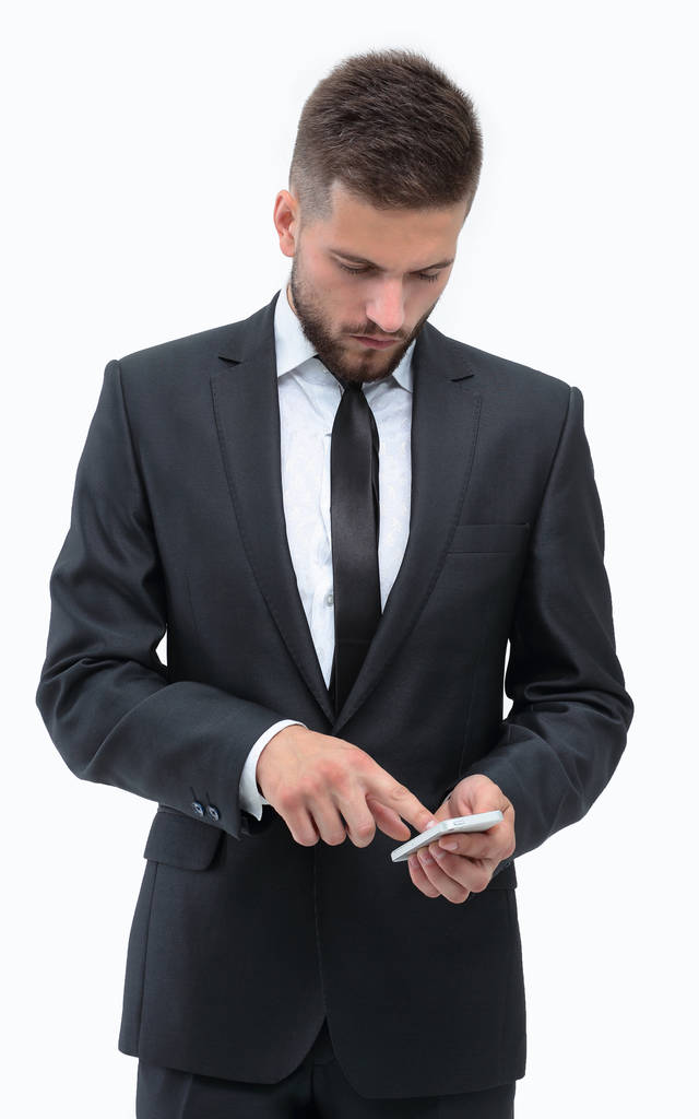 бізнесмен робить SMS на смартфоні
. - Фото, зображення