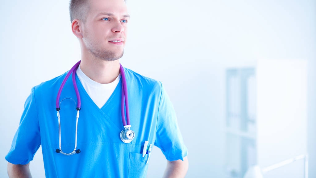 Lekarz z stetoskop stojący, na białym tle - Zdjęcie, obraz