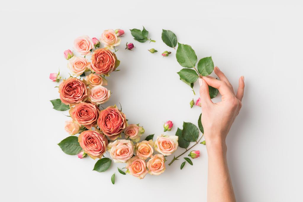 hand with flower wreath - Photo, Image