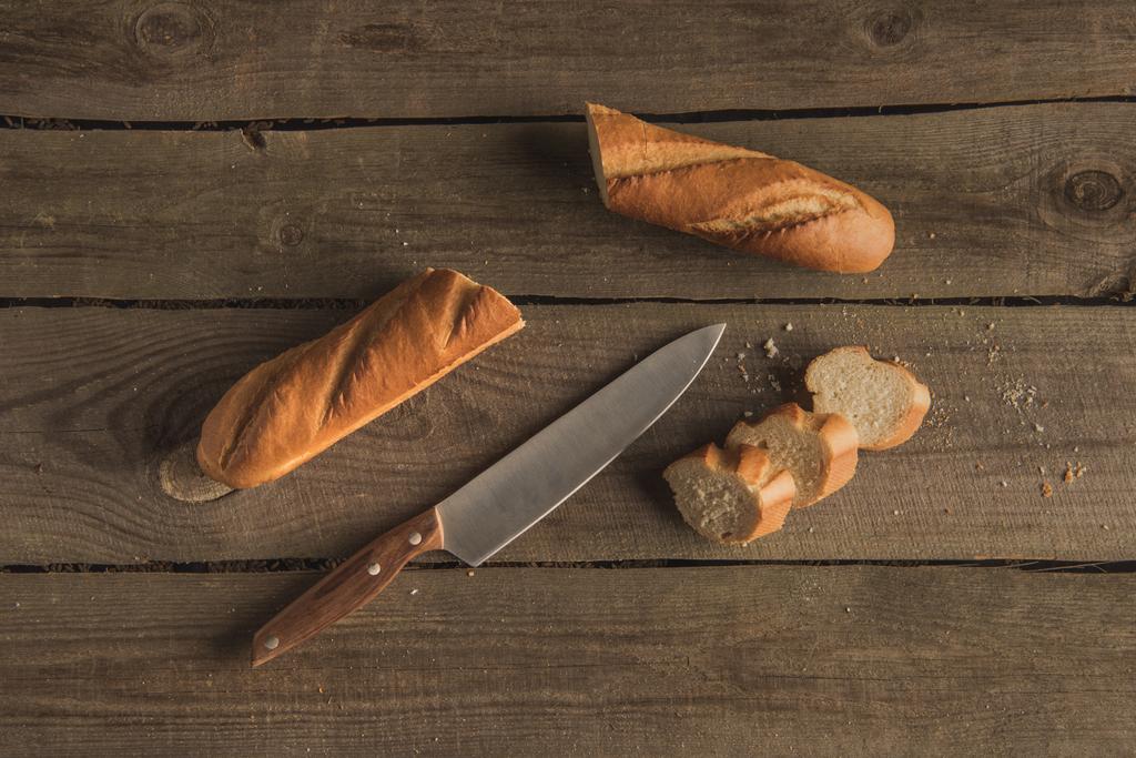 baguette and knife  - Photo, Image