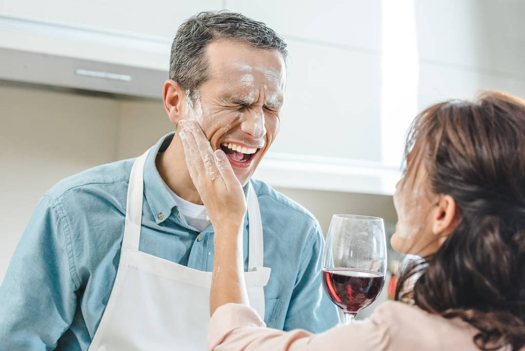couple in flour with wine - Photo, Image