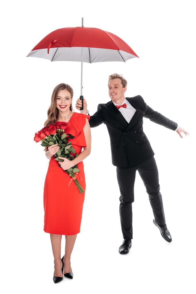 couple with umbrella and roses - Photo, Image