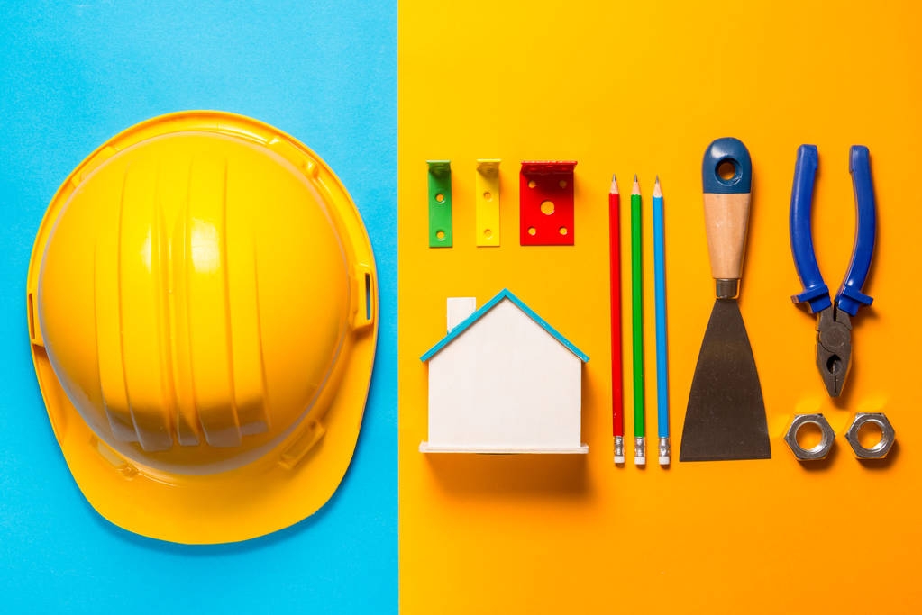 Herramientas de construcción sobre fondo colorido
 - Foto, imagen