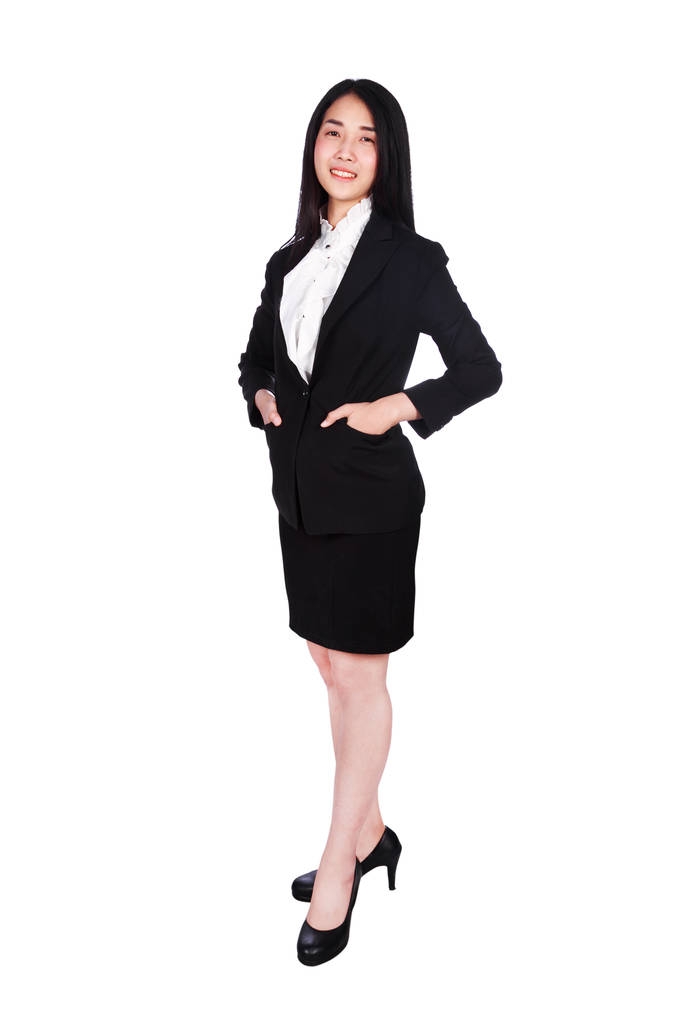 femme d'affaires souriant en costume debout relaxant et la main dans poc
 - Photo, image