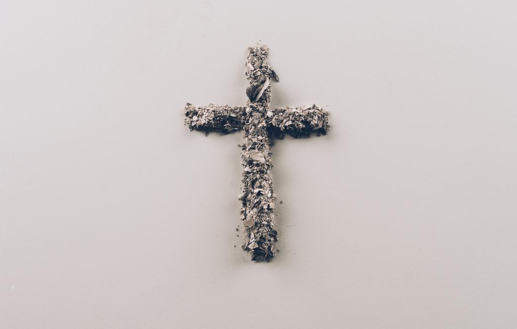 top view of cross shape from ash on white surface - Photo, Image