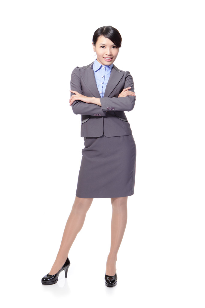 Mujer de negocios sonriente cruza los brazos
 - Foto, imagen