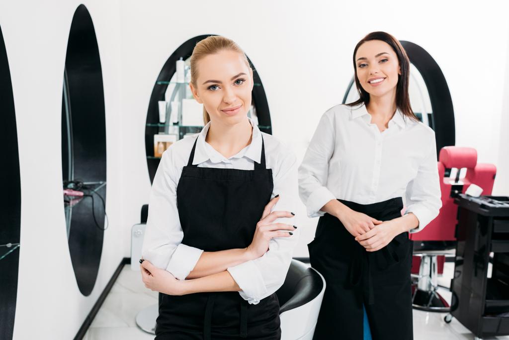 beautiful hairdressers at salon during working time - Photo, Image