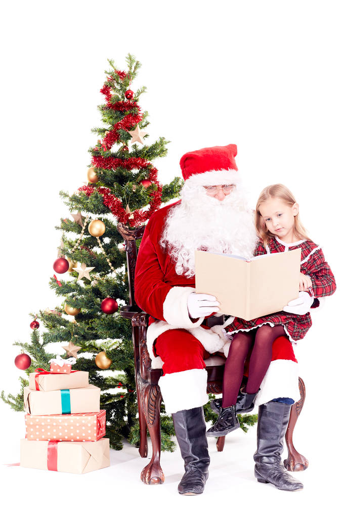 Sevimli kız için Santa okuma hikaye - Fotoğraf, Görsel
