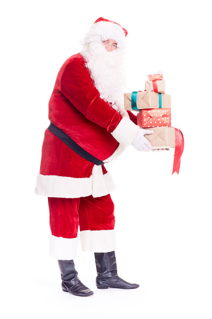 Papai Noel com montão de presentes
 - Foto, Imagem