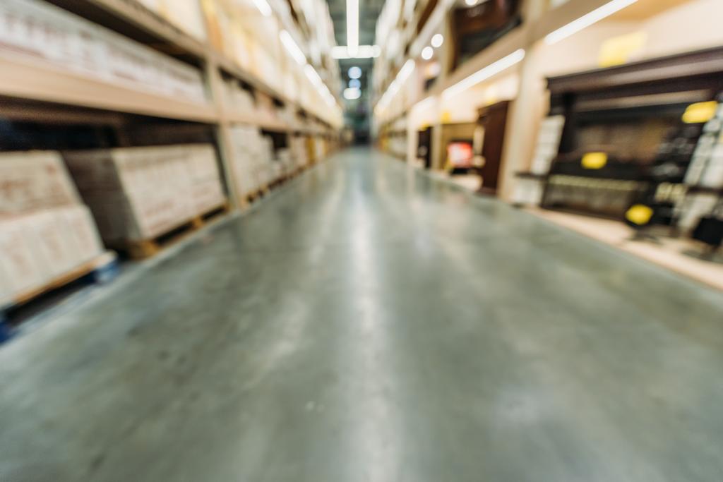 blurred view of shelves with boxes in warehouse - Photo, Image