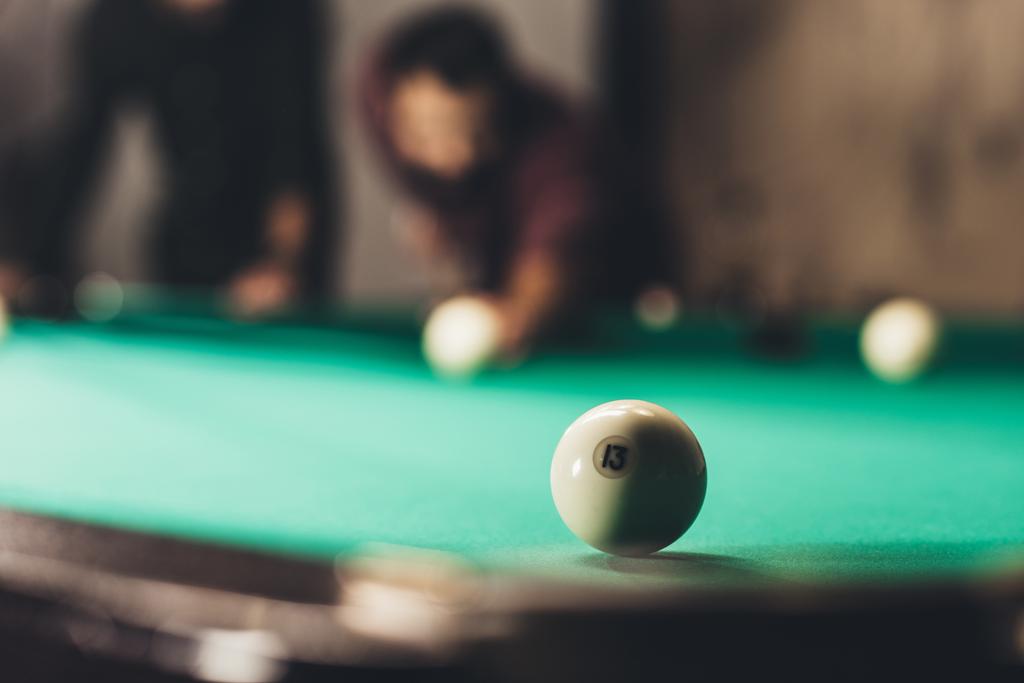 front view of men playing in russian pool. selective focus on ball - Photo, Image