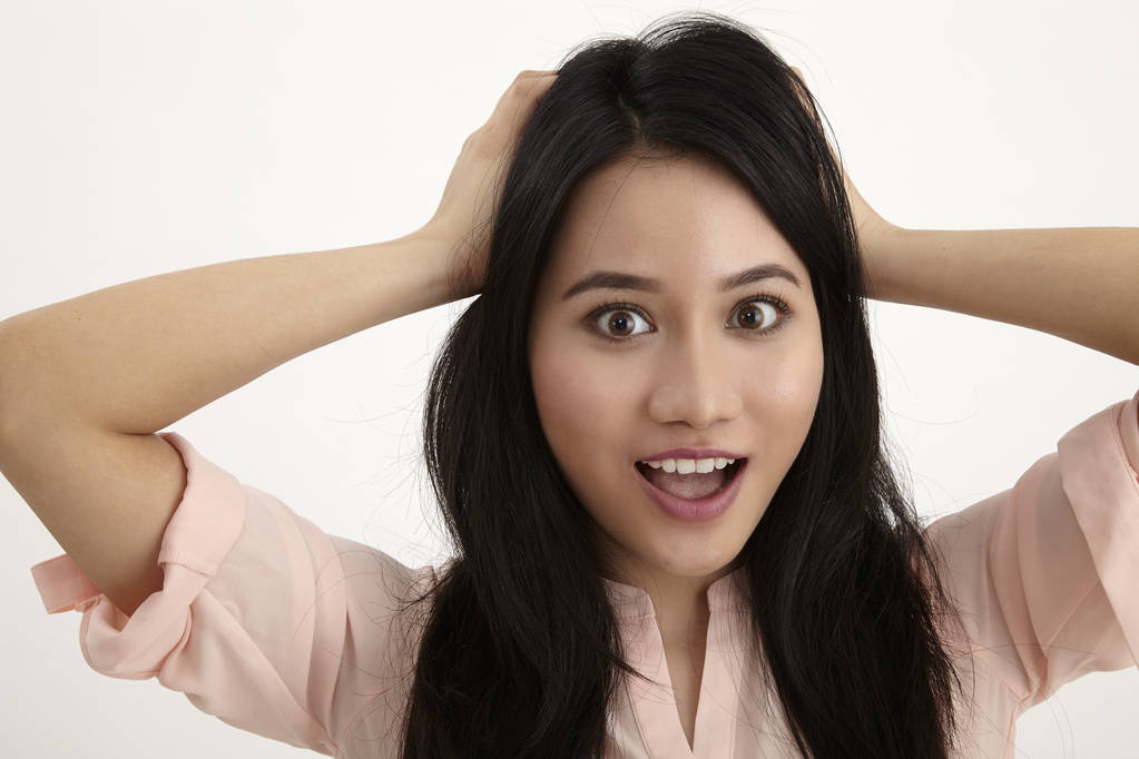 woman surprise with hand rest on head - Photo, Image