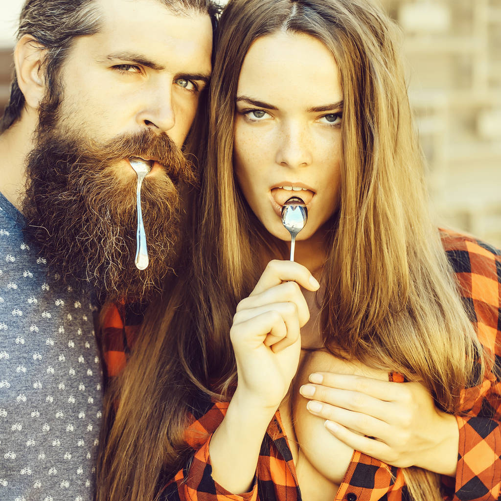young couple with tea spoon - Photo, Image