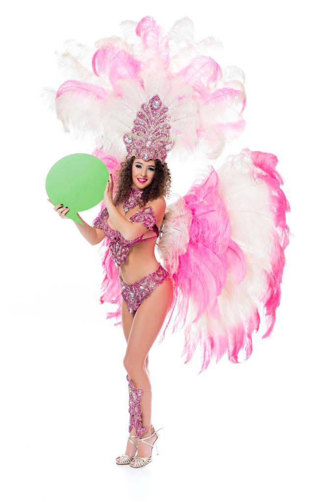 Žena v karnevalový kostým drží prázdné zelené textové bubliny, izolované na bílém   - Fotografie, Obrázek