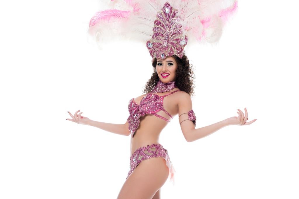 Mujer brillante en traje de carnaval con plumas rosas danzas aisladas en blanco
 - Foto, imagen