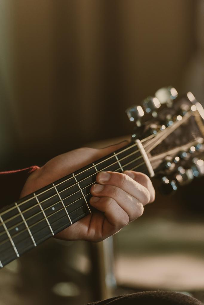 cropped shot of man playing acoustic guitar - Photo, Image