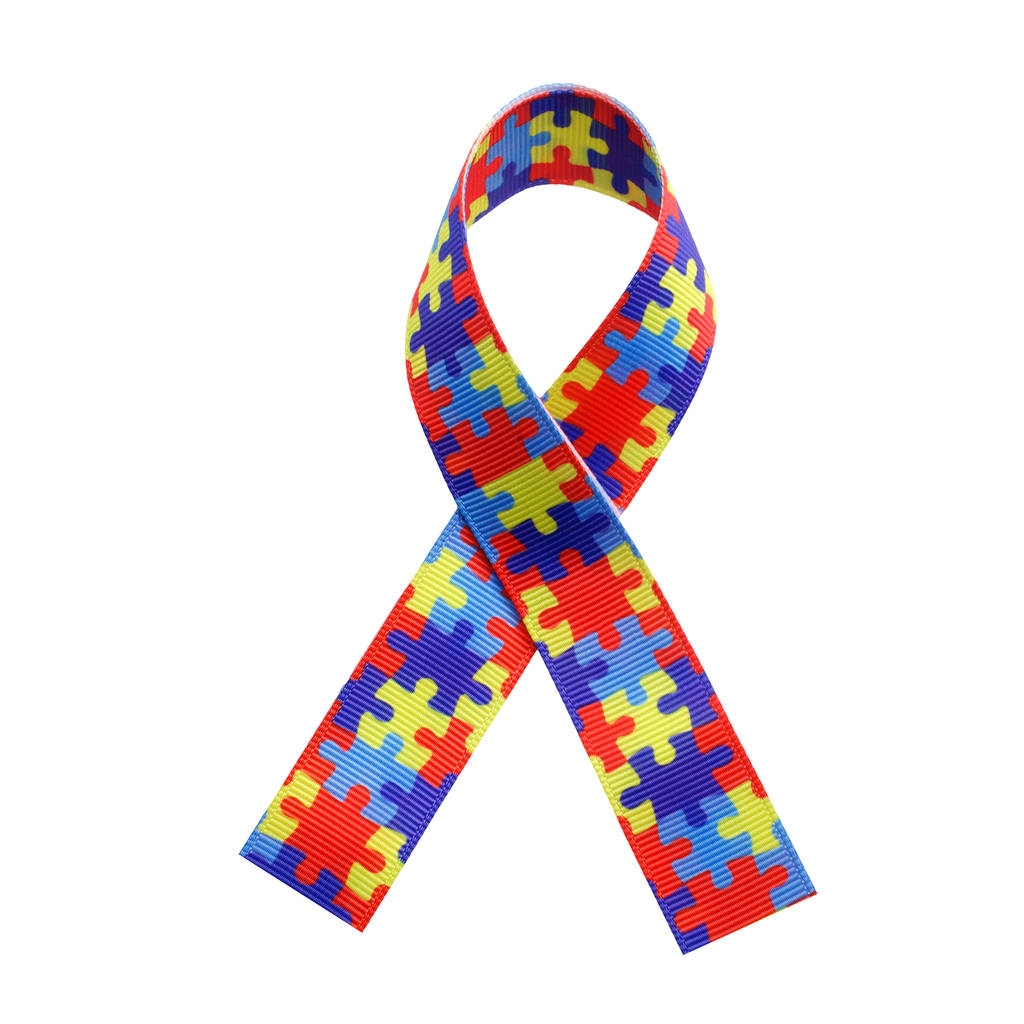 Welt-Autismus-Bewusstsein und Stolz Tag mit Puzzle-Muster Band isoliert auf weiß - Foto, Bild