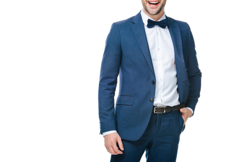 Μερική άποψη της χαμογελαστός άνθρωπος στο κοστούμι που απομονώνονται σε λευκό - Φωτογραφία, εικόνα