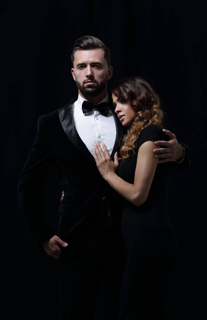 portrait of fashion couple on black background - Photo, Image