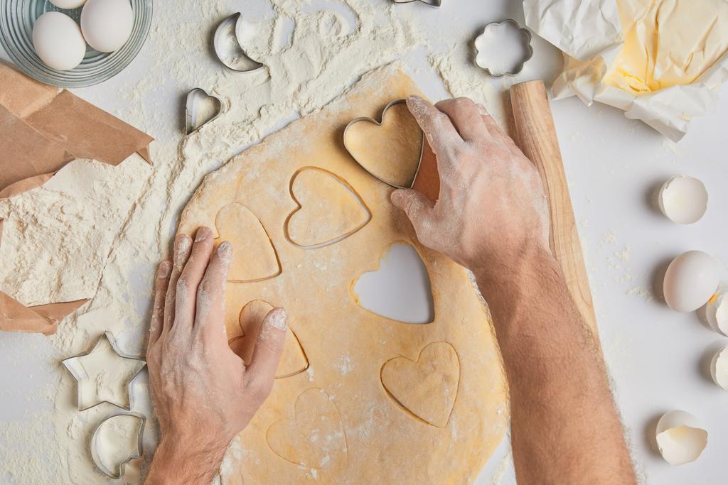 cropped image of chef preparing heart shaped cookies, valentines day concept - Photo, Image