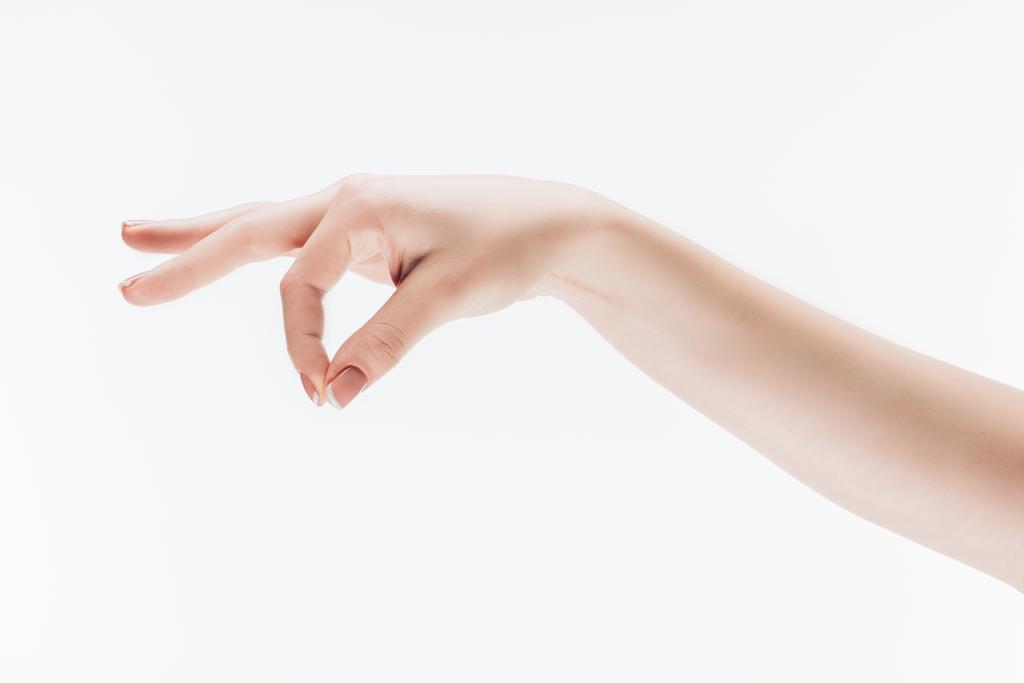 обрізаний знімок жіночої руки з дрібним жестом ізольовано на білому
 - Фото, зображення