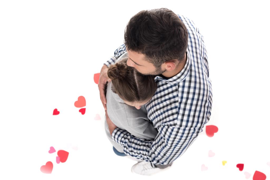 bovenaanzicht van paar knuffelen geïsoleerd op wit, Valentijnsdag concept - Foto, afbeelding