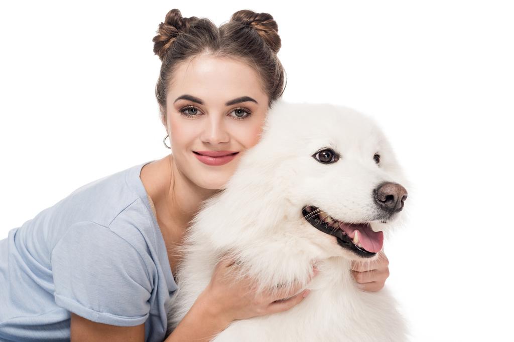 happy girl hugging dog isolated on white - Photo, Image