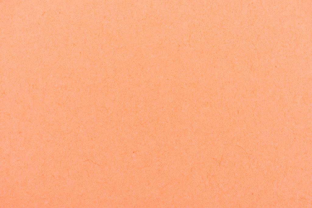 texture of peach-orange color paper as background - Photo, Image