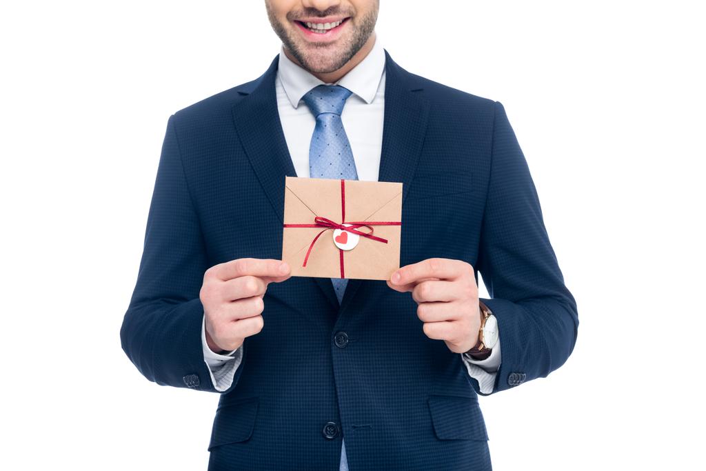 cropped view of beardman holding envelope for valentines day, isolated on white - Photo, Image