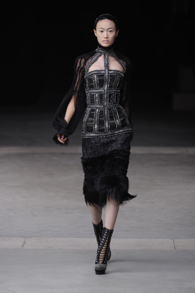 PARIS, FRANCE - MARCH 08: A model walks the runway during the Alexander McQueen Ready to Wear Autumn Winter 2011 2012 show during Paris Fashion Week at La Conciergerie on March 8, 2011 in Paris, Franc - Photo, Image