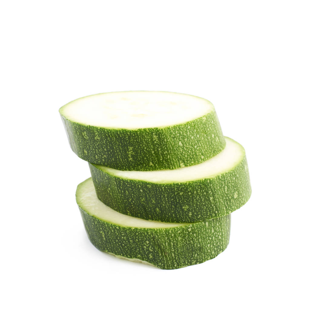 Montón de rodajas de calabacín verde
 - Foto, imagen