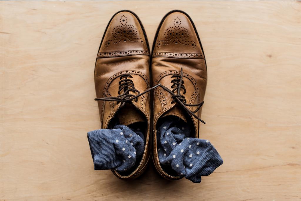 top view of brown male shoes with socks inside - Photo, Image