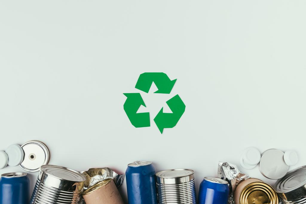 flat lay with different cans and recycle sign isolated on grey - Photo, Image