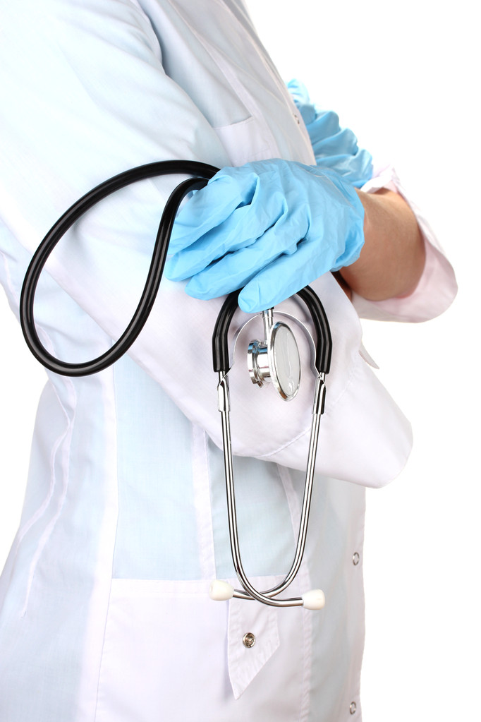 Docteur avec stéthoscope à la main. isolé sur blanc
 - Photo, image