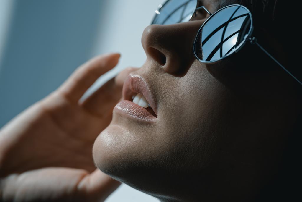 headshot of beautiful fashionable girl with reflection in sunglasses  - Photo, Image