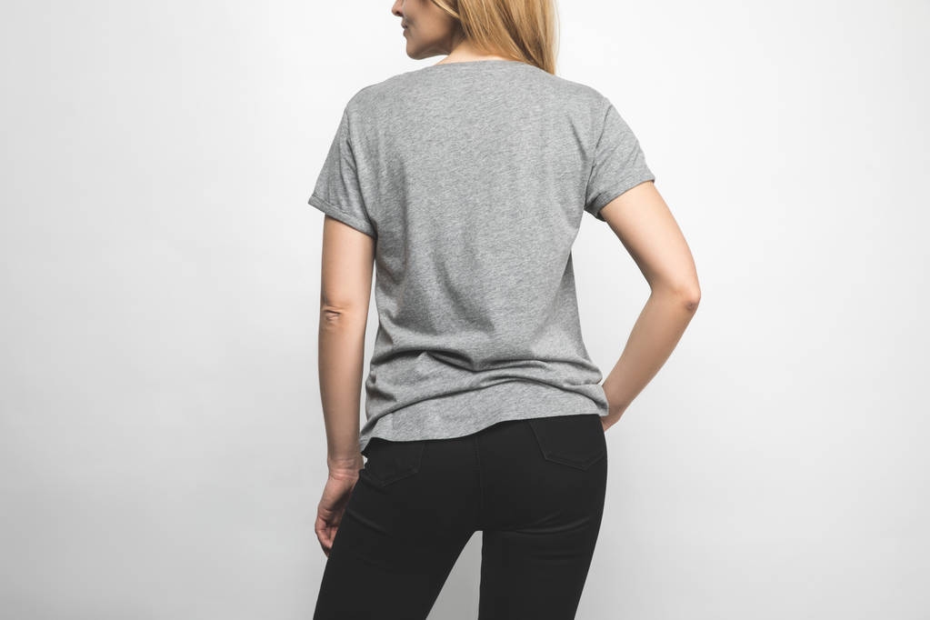 vista posteriore della donna in t-shirt bianca grigia su bianco
 - Foto, immagini