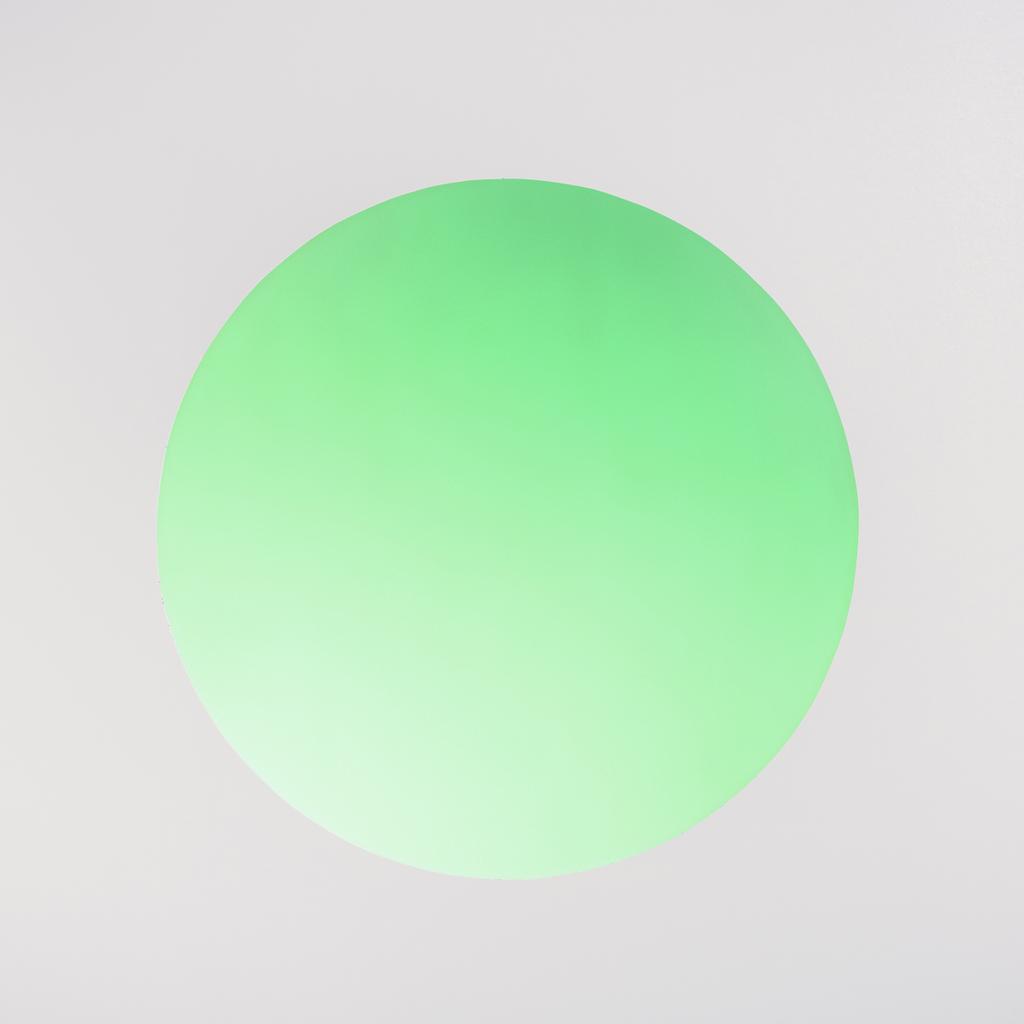 agujero verde redondo con espacio de copia en gris
 - Foto, Imagen