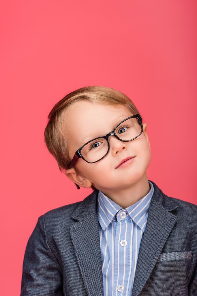 portrait of cute little boy in eyeglasses isolated on pink - Photo, Image