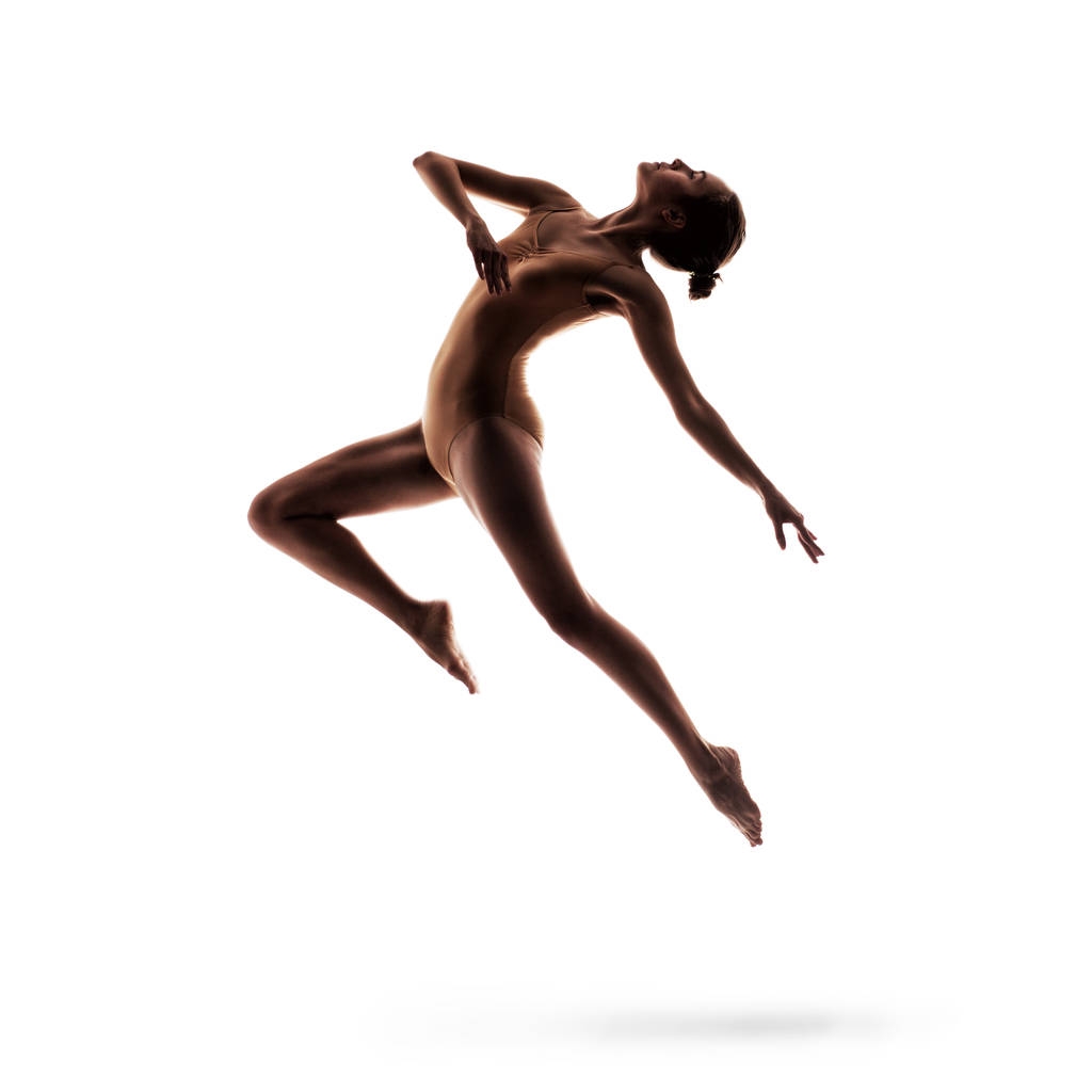 fiatal gyönyörű táncos bézs fürdőruhában pózol - Fotó, kép
