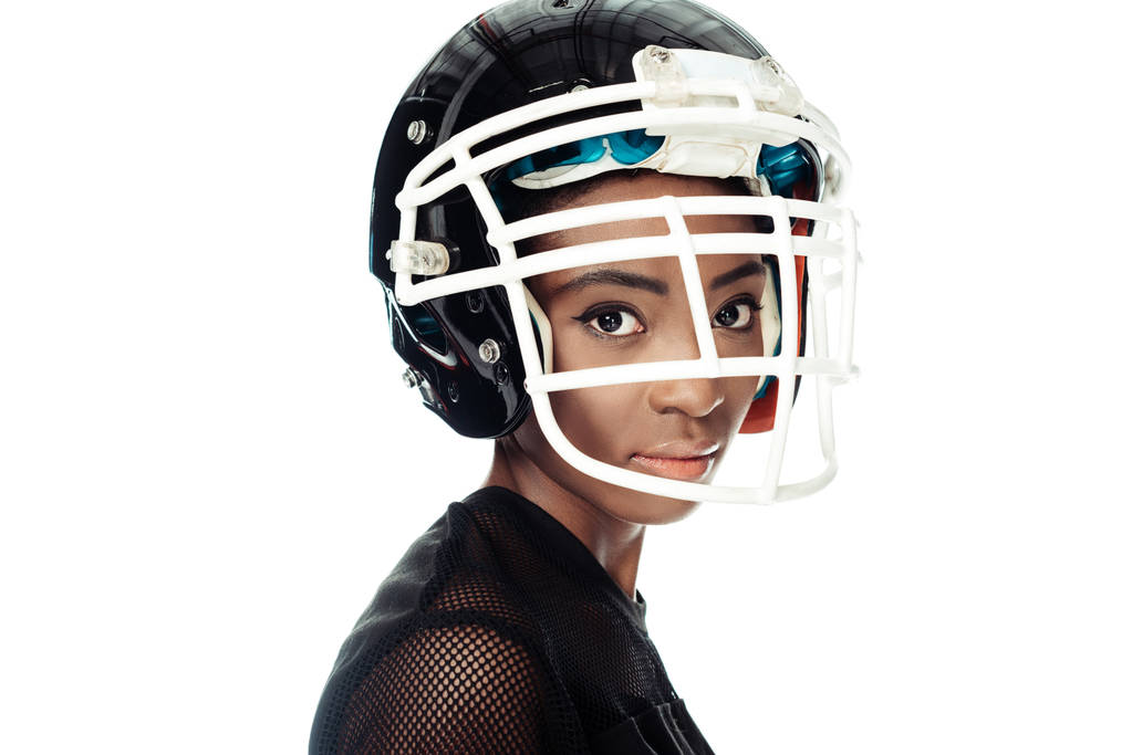 close-up portrait of female american football player in helmet isolated on white - Photo, Image