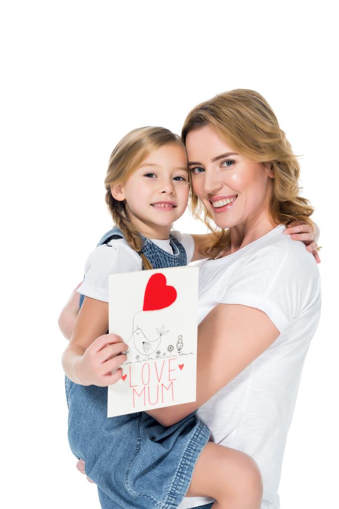 mom and daughter with greeting card for mothers day, isolated on white - Photo, Image