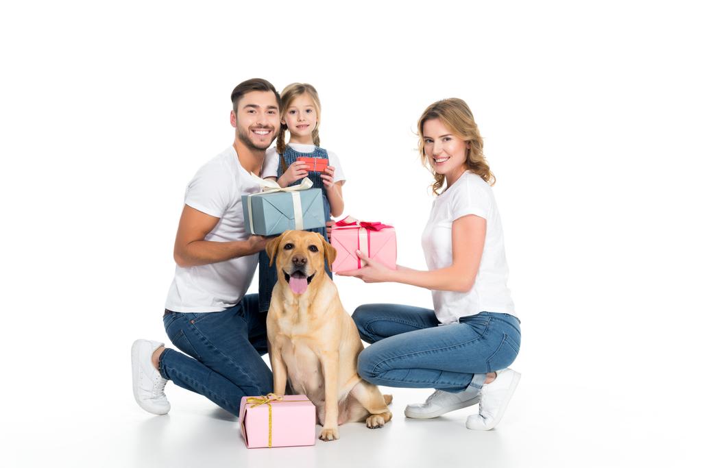 happy family and dog with presents, isolated on white - Photo, Image