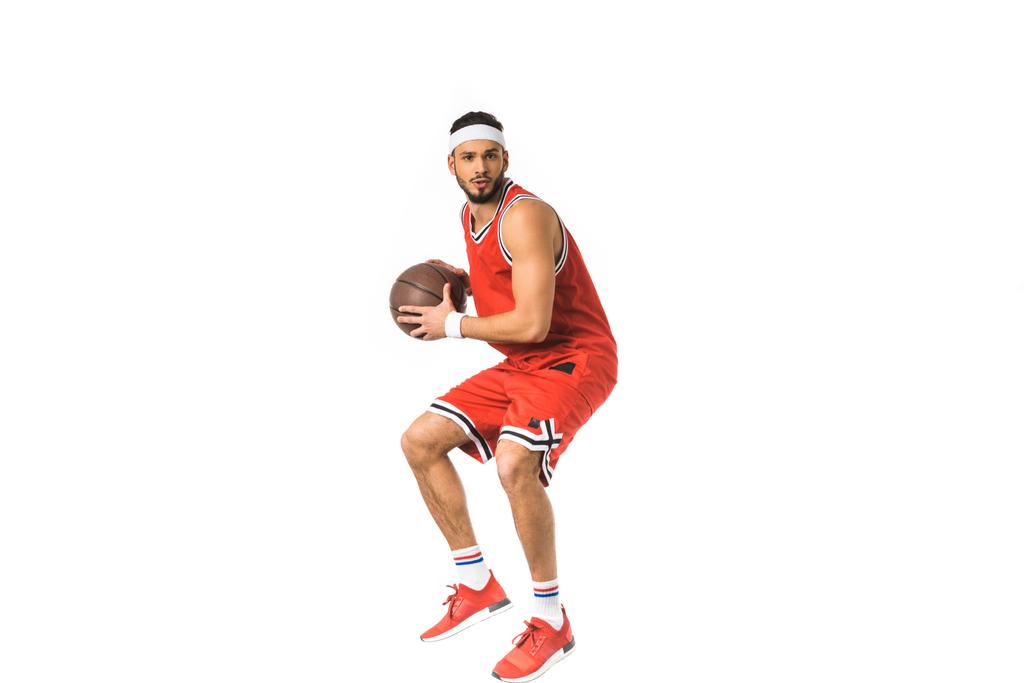 young sportsman playing basketball isolated on white - Photo, Image