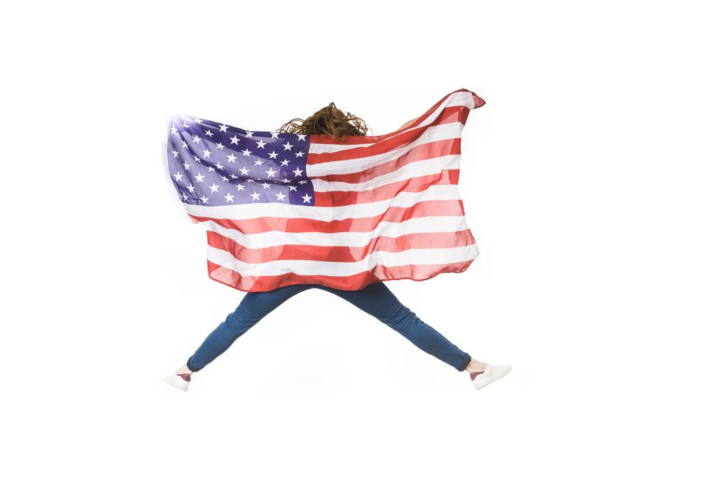visão traseira da jovem com bandeira americana pulando isolado no branco
 - Foto, Imagem