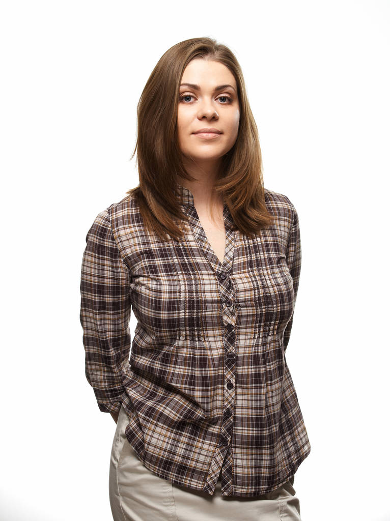 portrait of beautiful woman in checkered shirt with hands behind back isolated over white background - Photo, Image