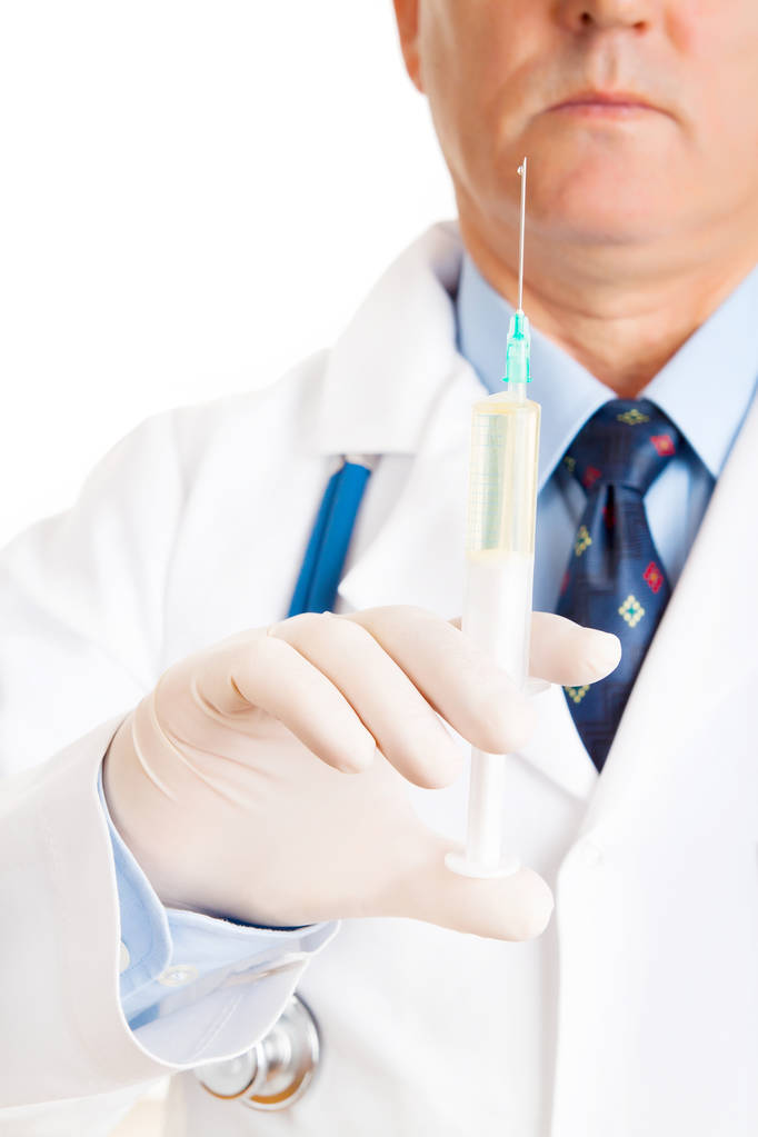 male doctor holding syringe in hand, close-up - Photo, Image