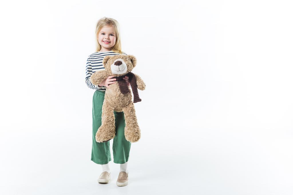 stylish little child with teddy bear isolated on white - Photo, Image
